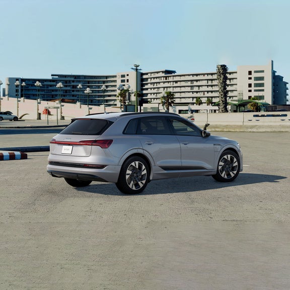 Three-quarter rear profile of the Audi e-tron. 