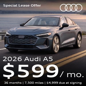 A gray A6 driving.