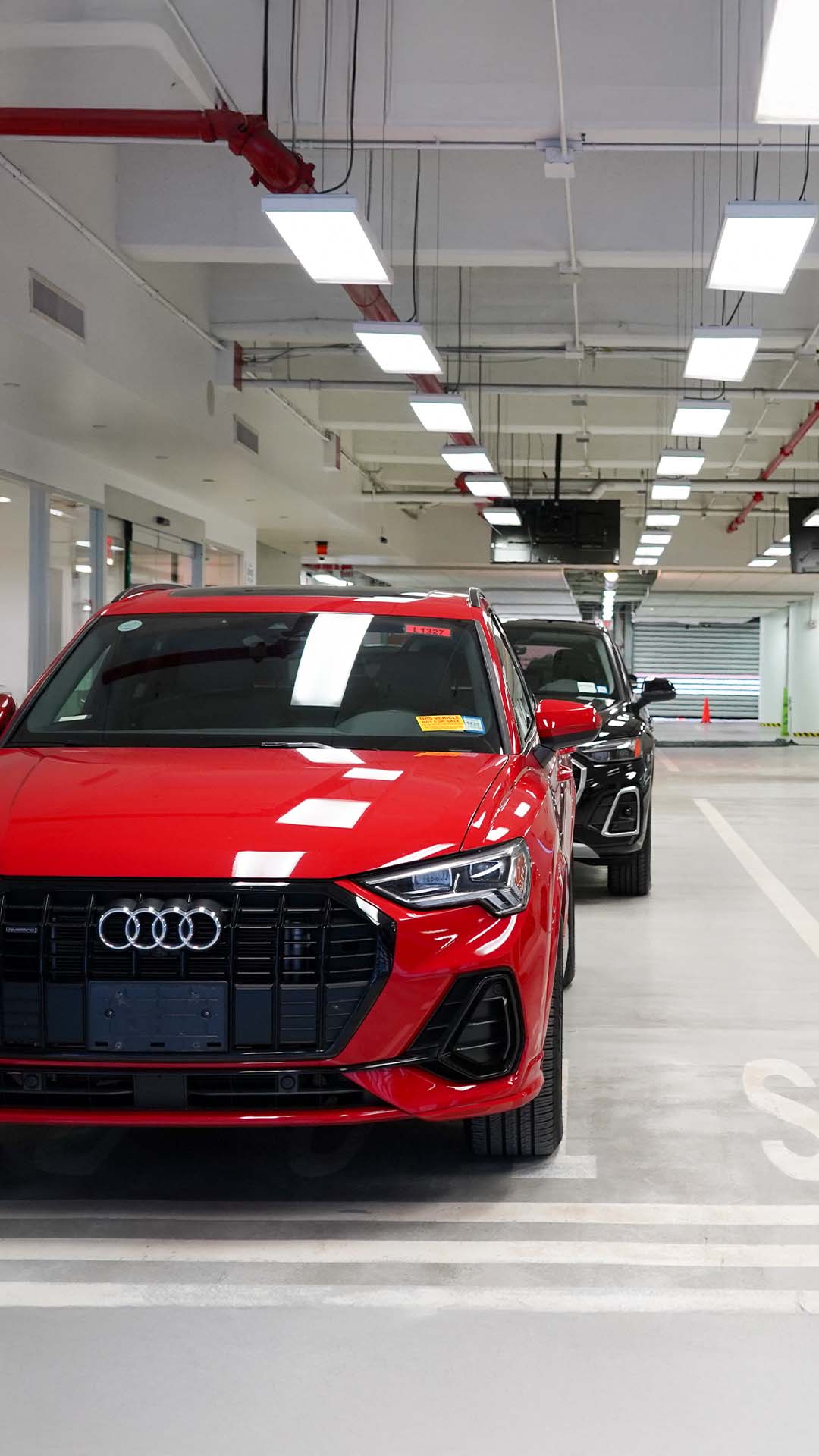 Red Audi Vehicle in service center