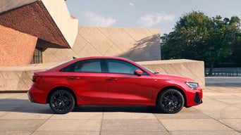 Side view of an Audi A3 parked.