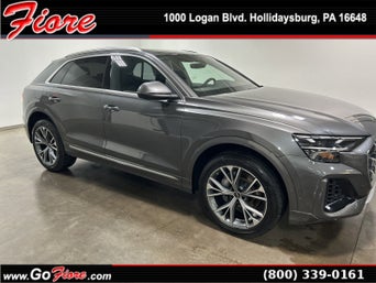 Side profile view of an Audi Q8. 