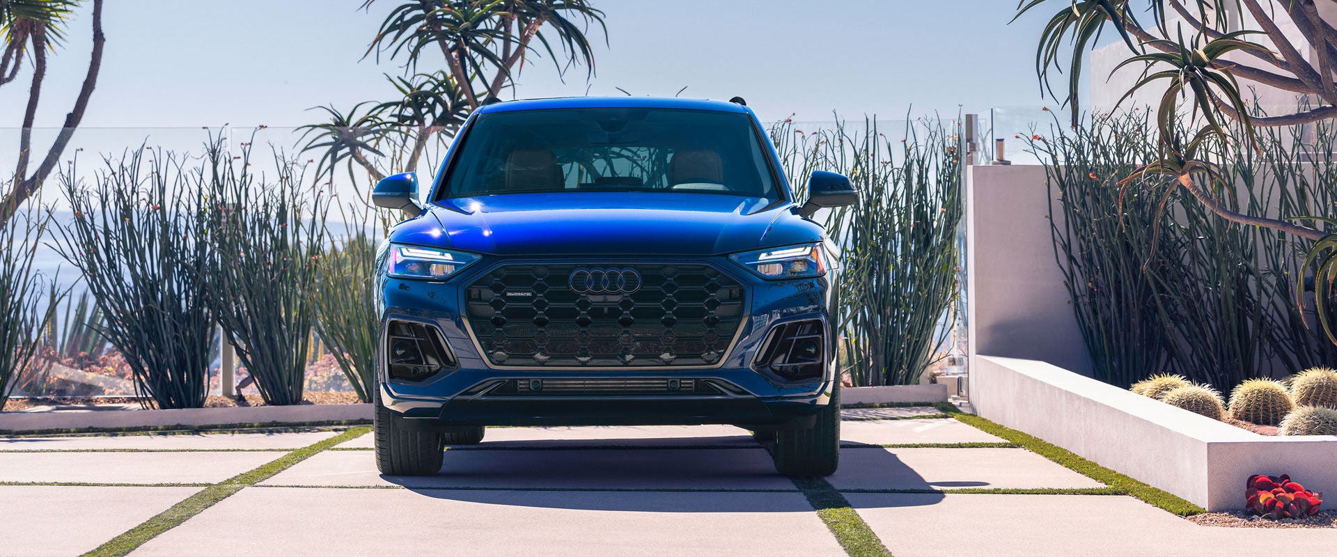 Exterior image of a blue Audi Q5 viewed from the front