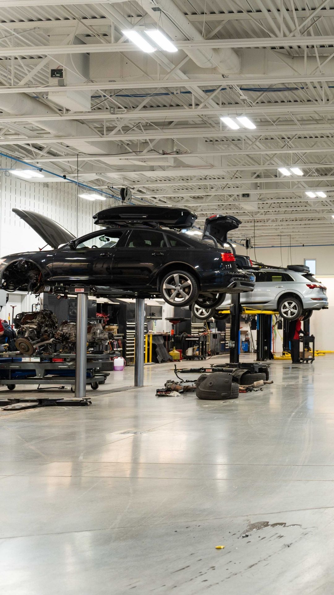 Profile view of an Audi vehicle accelerating.
