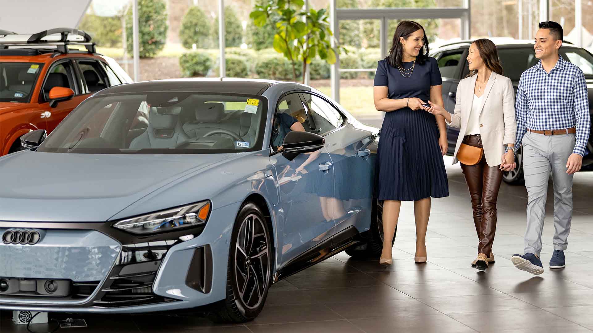 Front profile view of an Audi Vehicle parked.