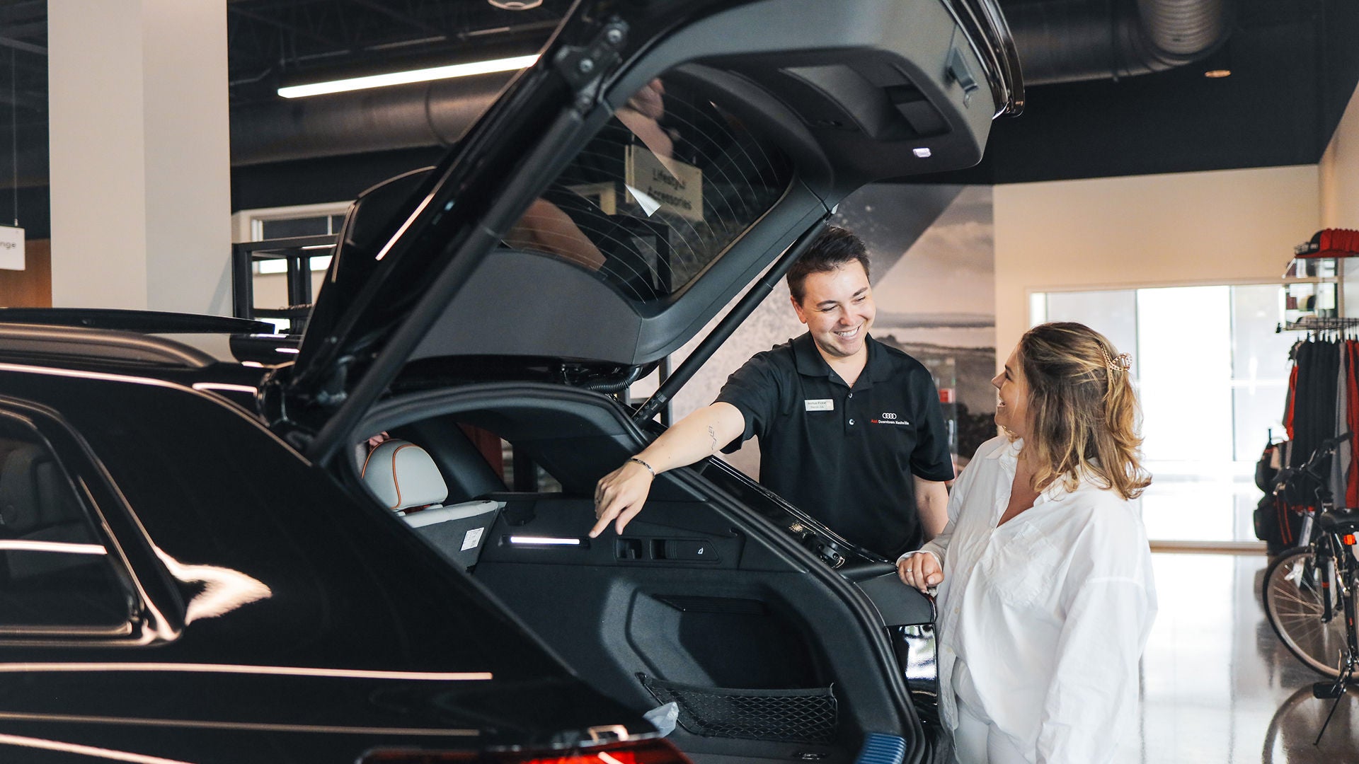Audi employee polishing an Audi SUV