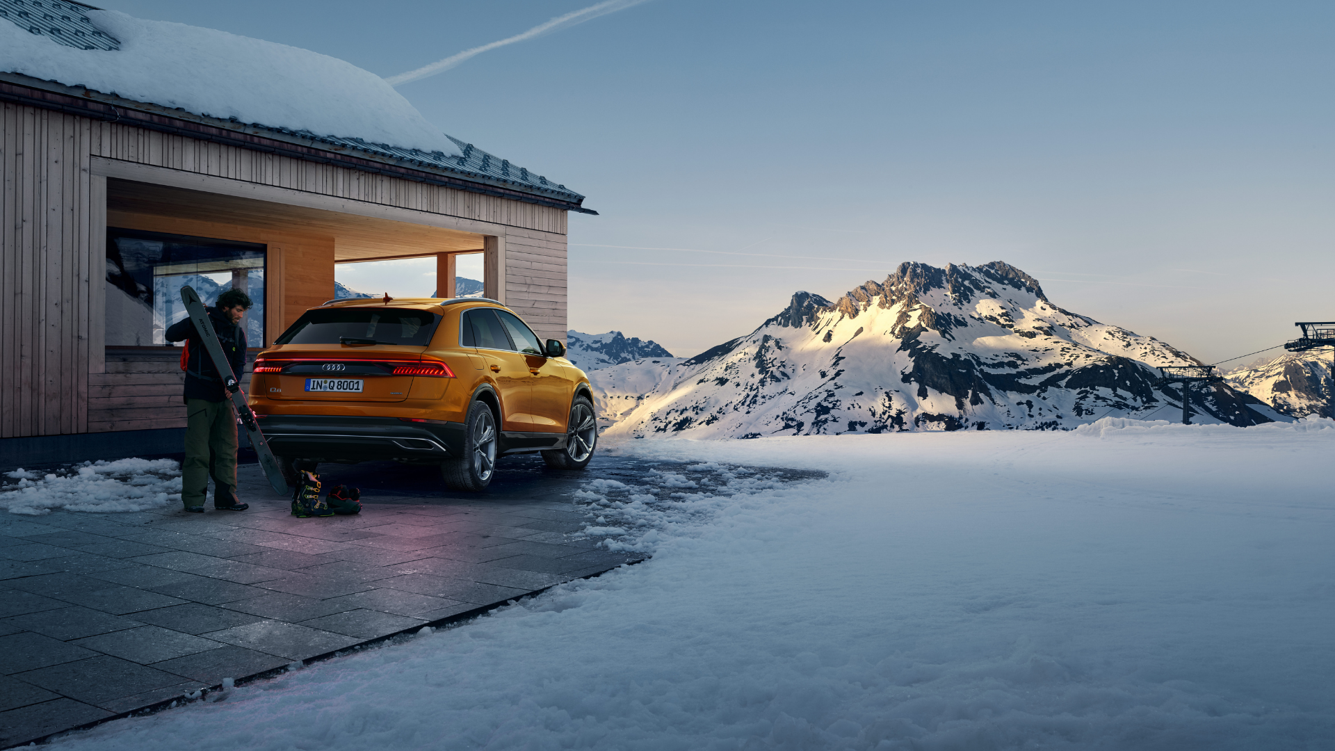 Orange Audi Man With Skis