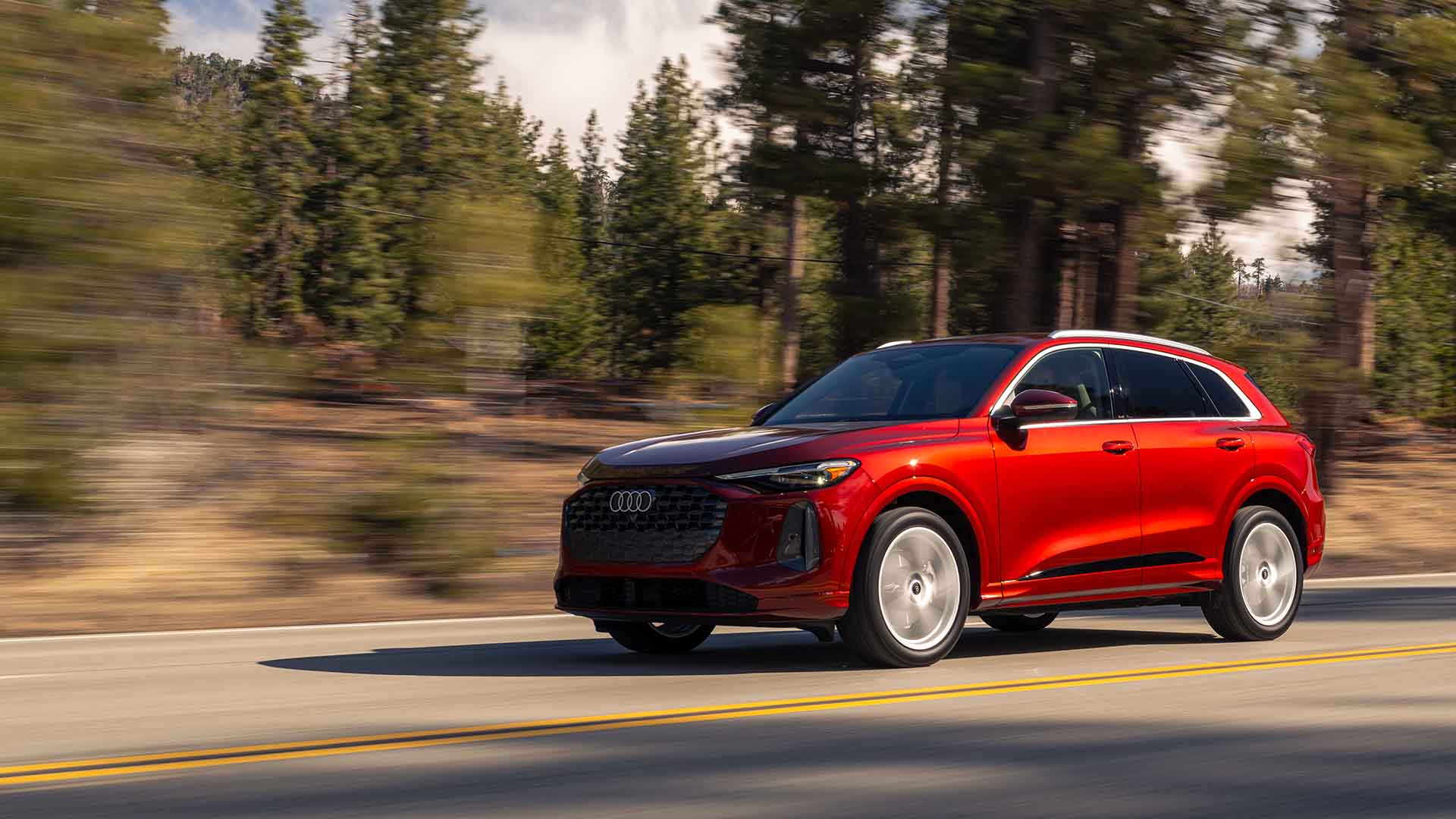 Side view of a red 2025 Audi Q5