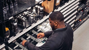 Service technician inspecting material