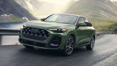 Close three quarter view of the Audi Q5 Sportback accelerating on the highway
