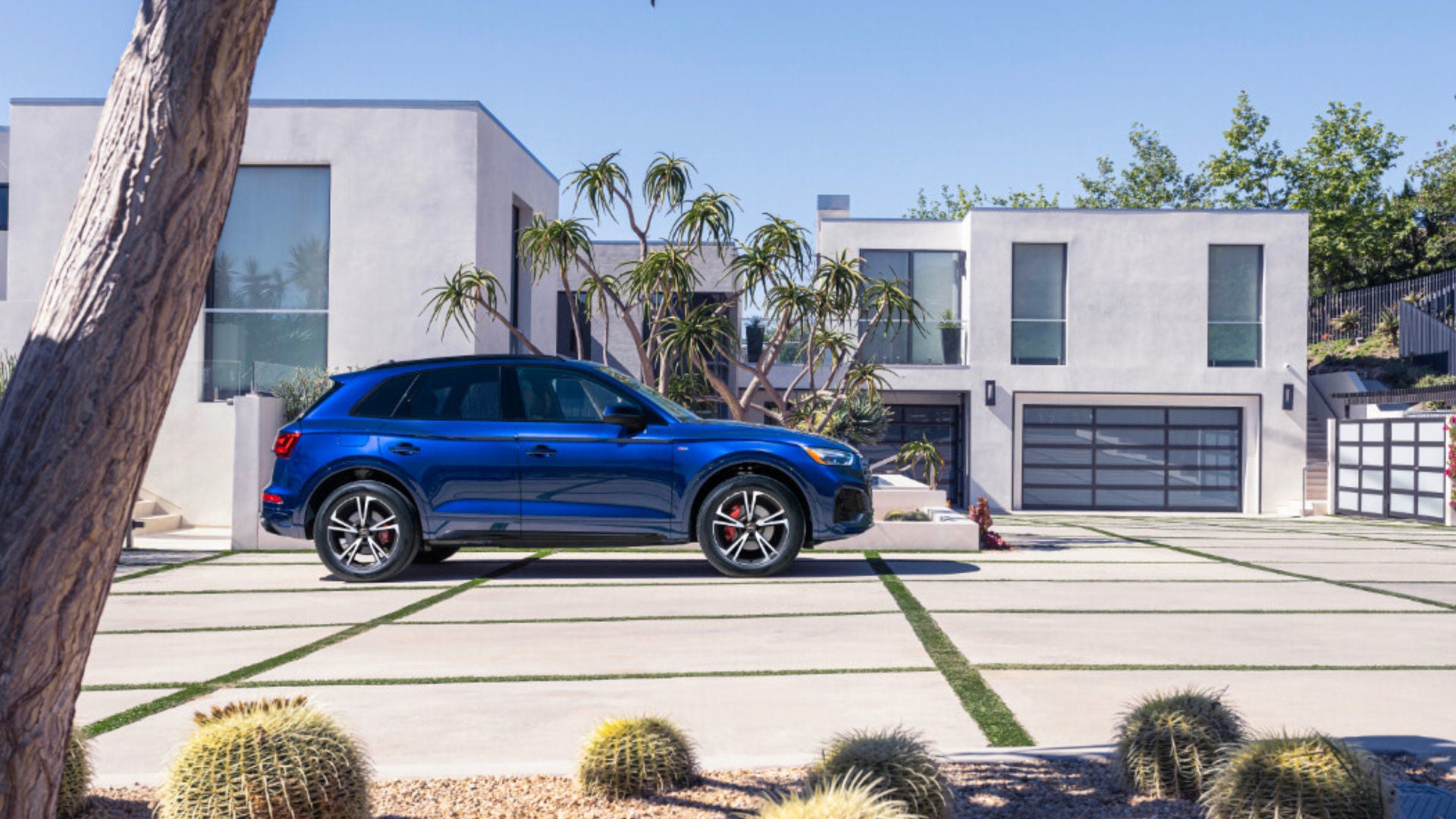 2025 Audi Q5 Exterior Parked In Driveway By Desert Plants