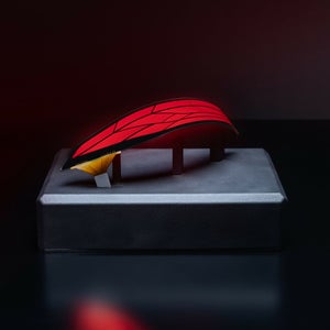 View of the curved OLED taillight glass that is featured on the Audi Q9 on a pedestal.