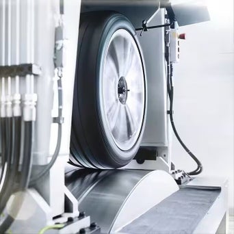 Service technician servicing air filter.