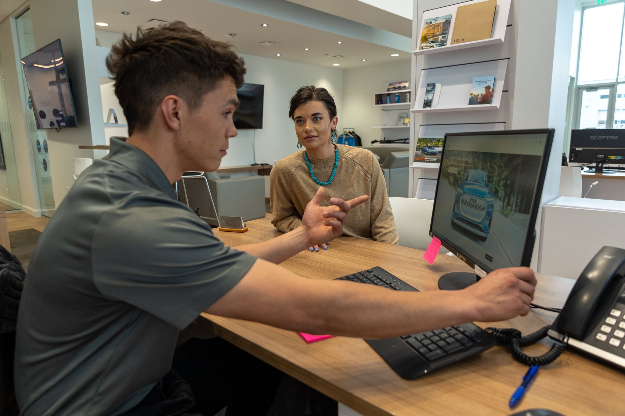 Audi Bozeman service employee speaking with Audi owner about service