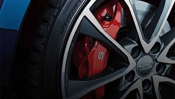 Servicing tire at Audi