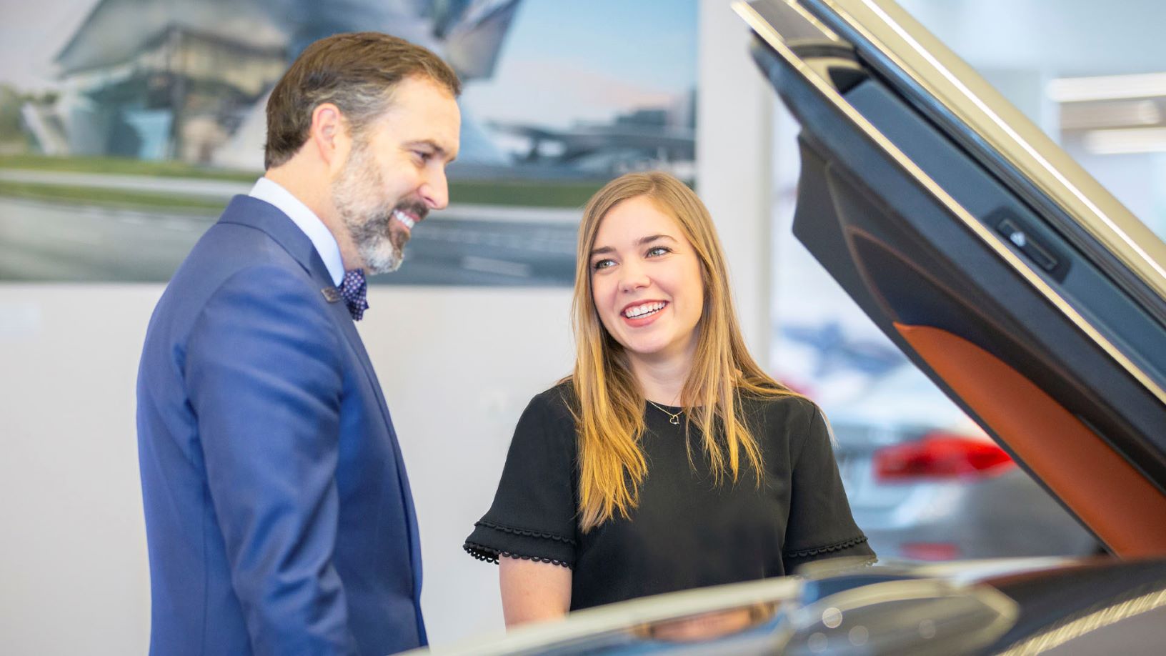 Associate appraising a customer's vehicle.