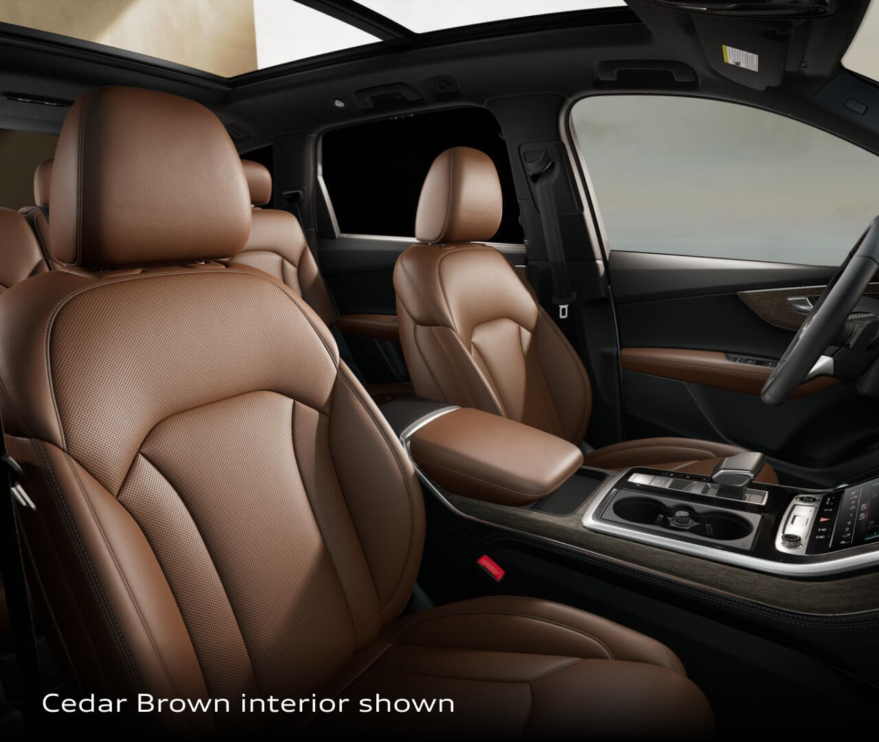 Interior front seat view of the 2026 Audi Q7 showing cedar brown leather interior