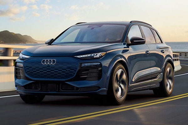 Front view of an Audi SUV accelerating.