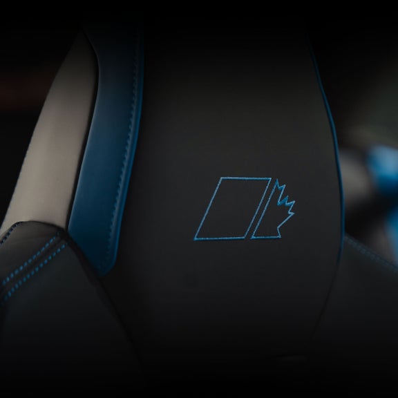 Close-up on the Maple Leaf Edition embroidery on the head rests of the Audi SQ8.