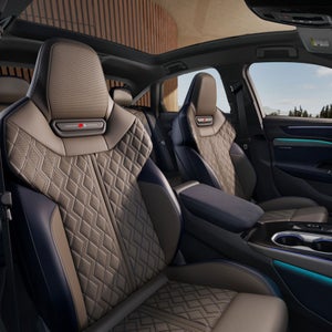 Interior view of the front seats in the Audi A6 Sedan.
