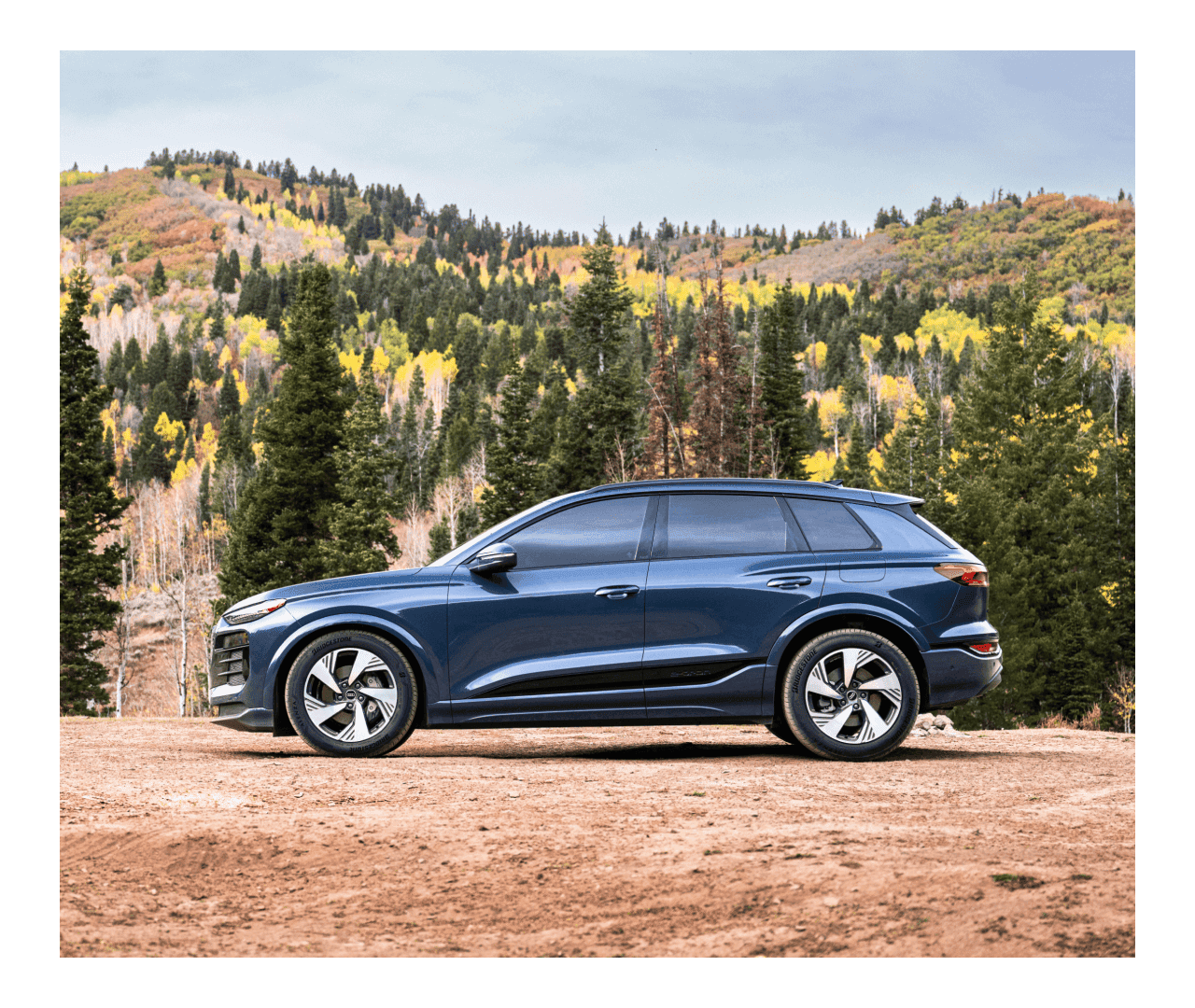 2025 Audi Q6 e-tron parked in the wilderness of Upstate New York during the summer