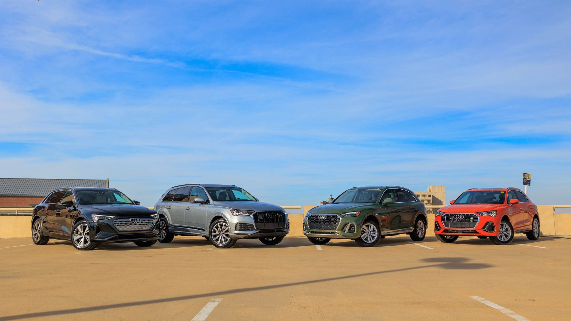 Left profile view of an Audi q8 vehicle parked.