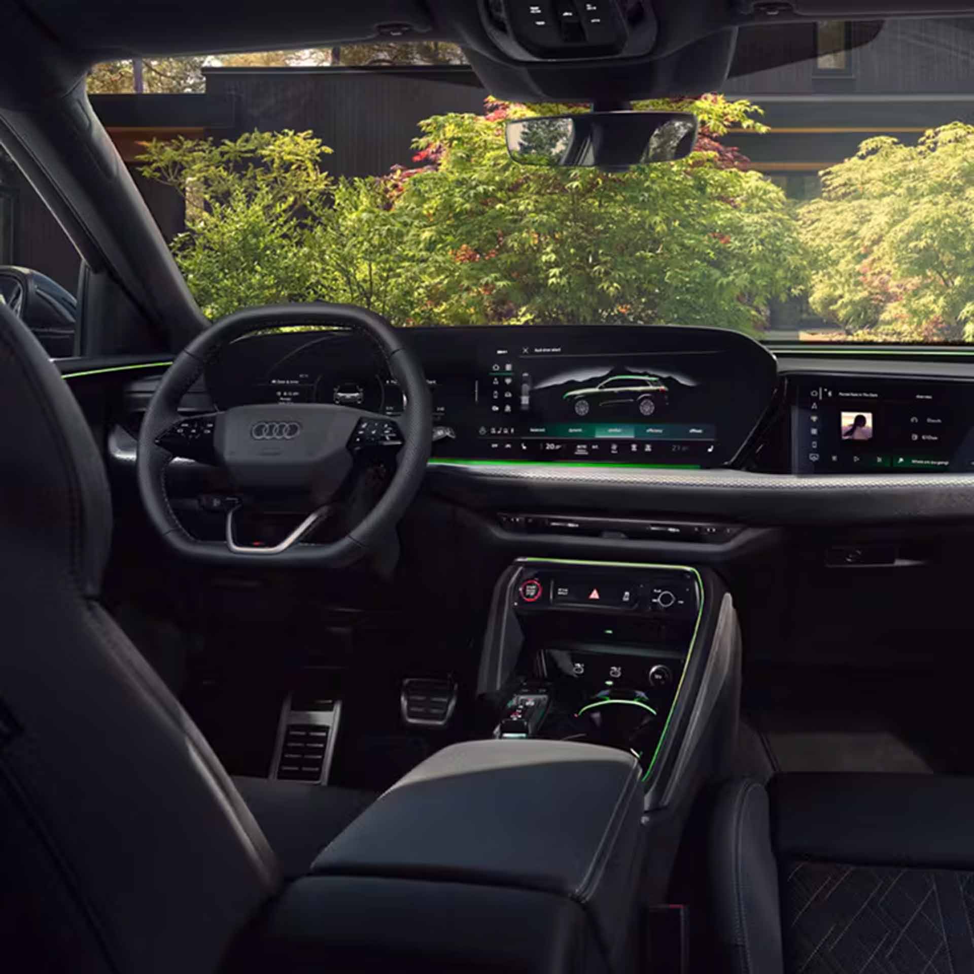 Interior of the 2025 Audi Q5 from the backseat view.