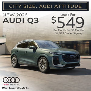 Side view of an Audi vehicle.