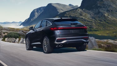 Rear view of the Audi SQ5 Sportback accelerating away.