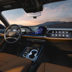 View of the wraparound virtual cockpit in the Audi A6 Sedan. 