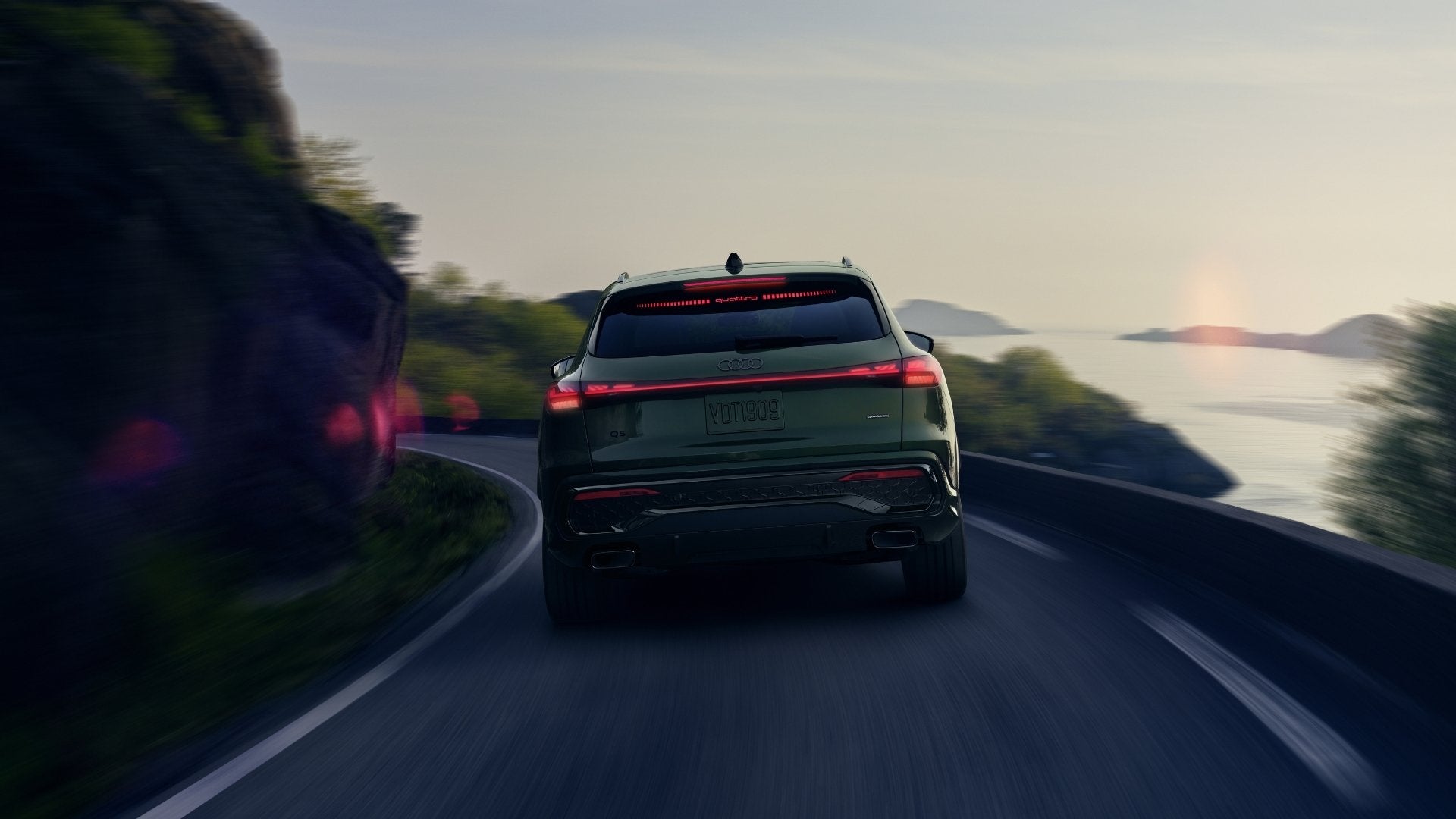 How do cargo space, towing capacity, and hybrid range compare among these SUVs?