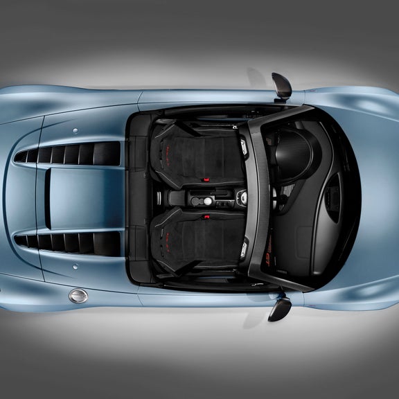 Bird's eye view of the interior of a blue Audi R8 Spyder GT. 