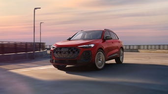 Three-quarter front view of the Audi SQ5 in motion.
