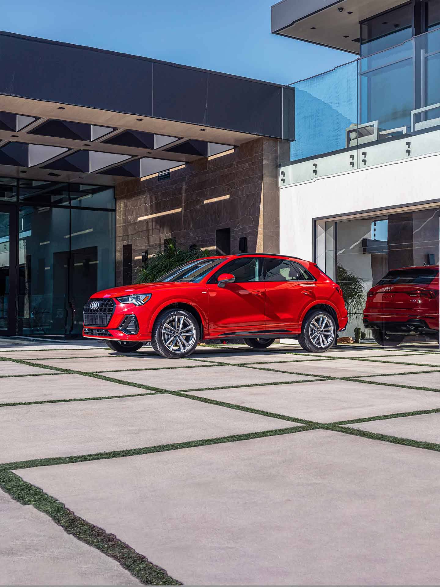 Three-quarter side profile of the Audi Q3.