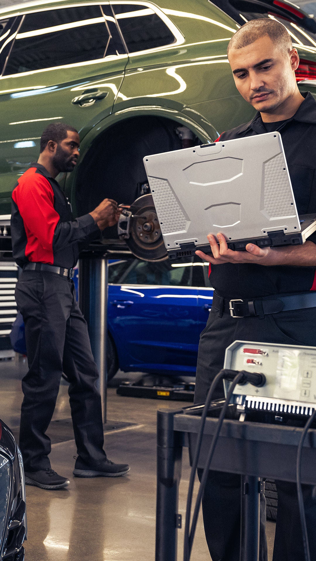 Service technician speaking with another technician