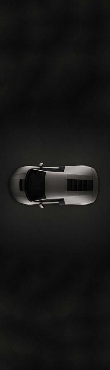 Overhead view of the top of the Audi Nuvolari in a darkened room.