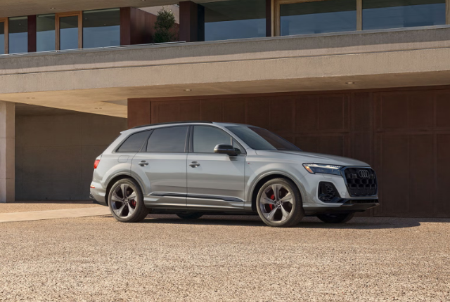 2026 Audi Q7 parked outside a modern residential garage