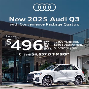 Side view of an Audi Q3 driving.