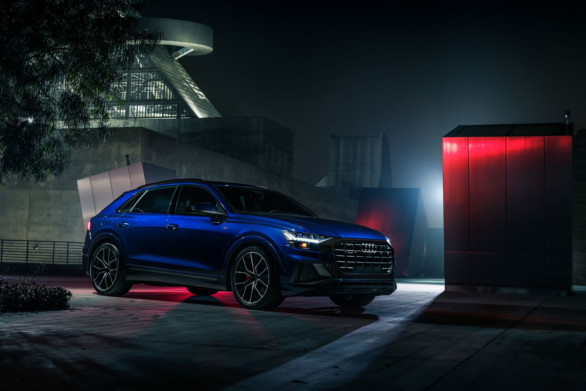 Audi Q8 side parked.
