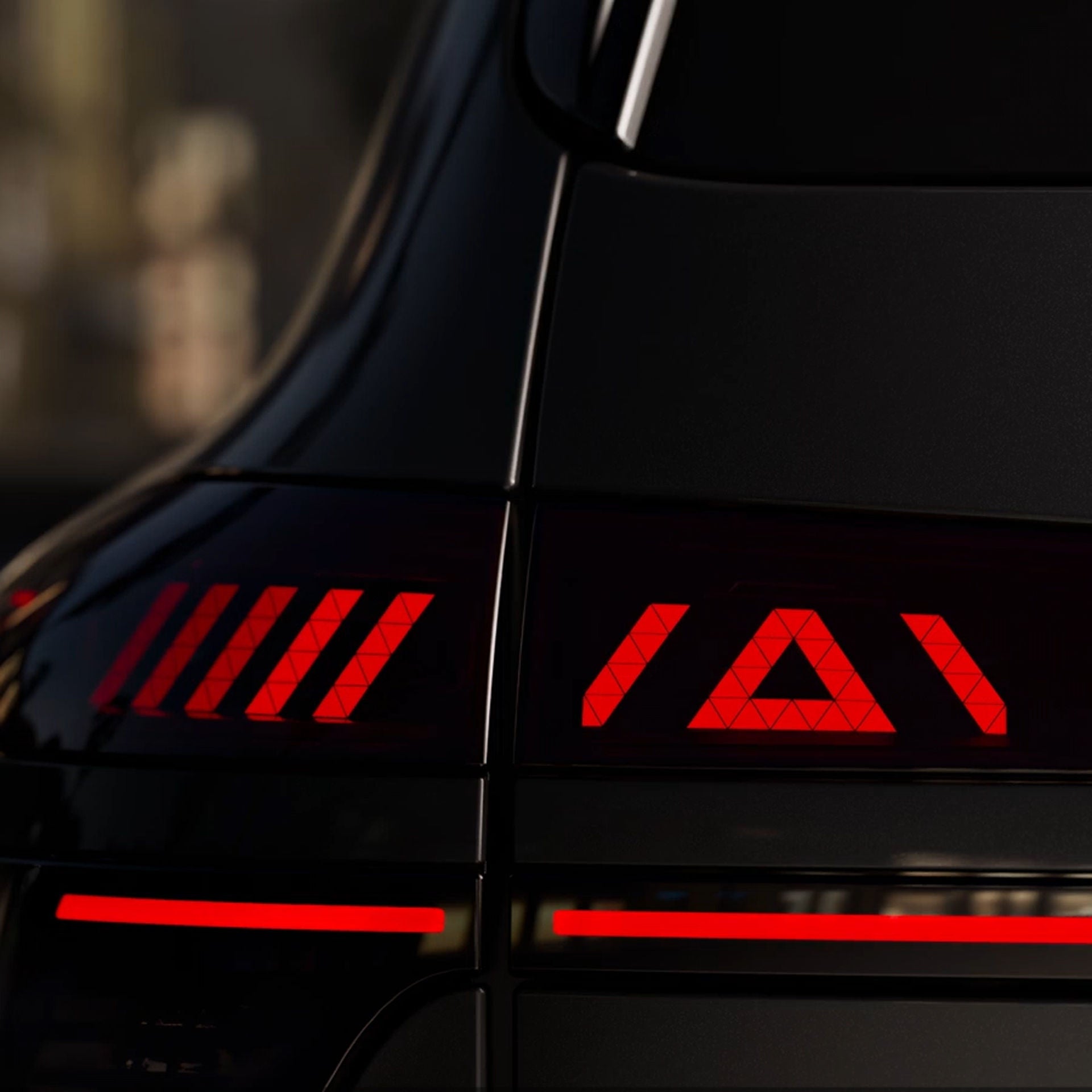 Close-up on a lit-up taillight on the Audi SQ9.
