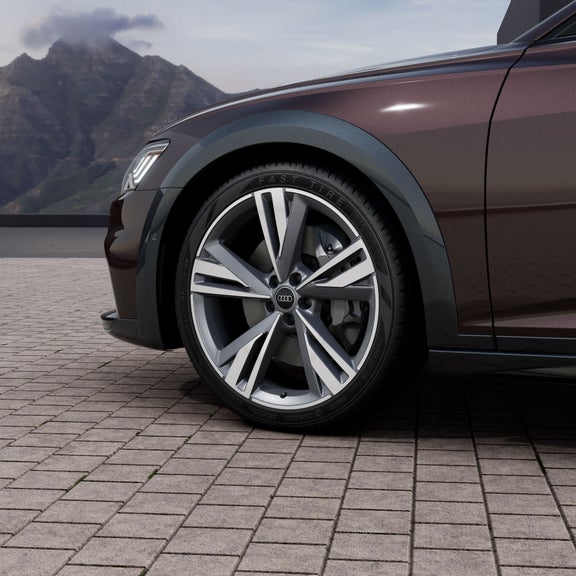 Close-up of the front wheel of the Audi A6 allroad.