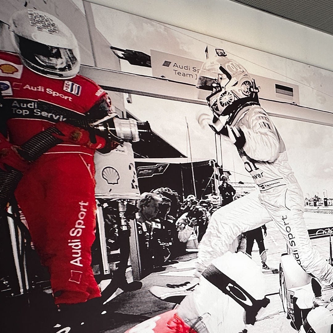 Specials Audi shop with orange Audi Q3 in service