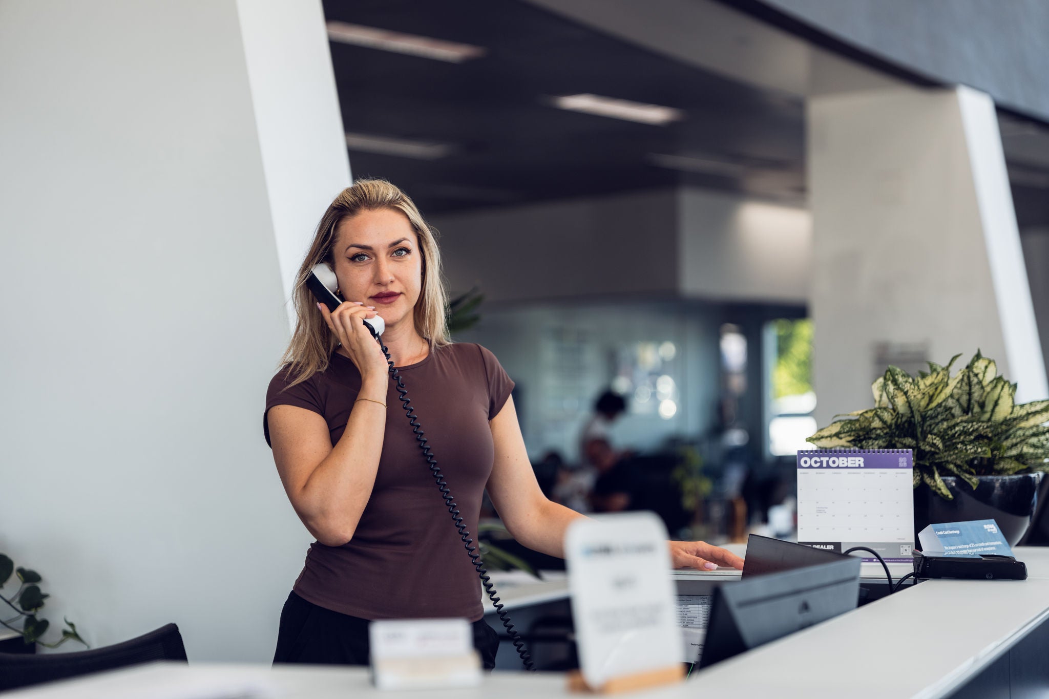 Audi employee on the phone.