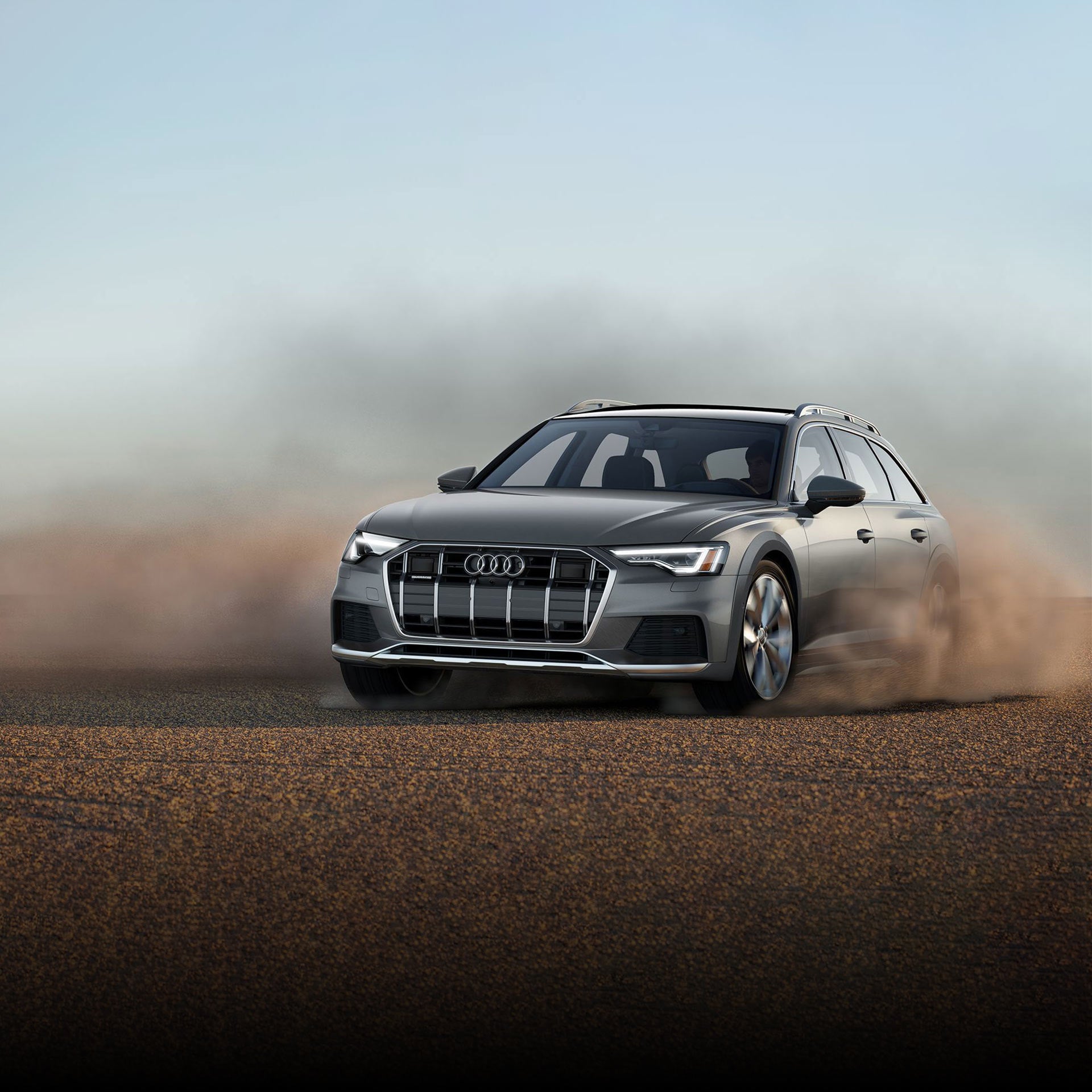 Three quarter view of an A6 Allroad in motion.