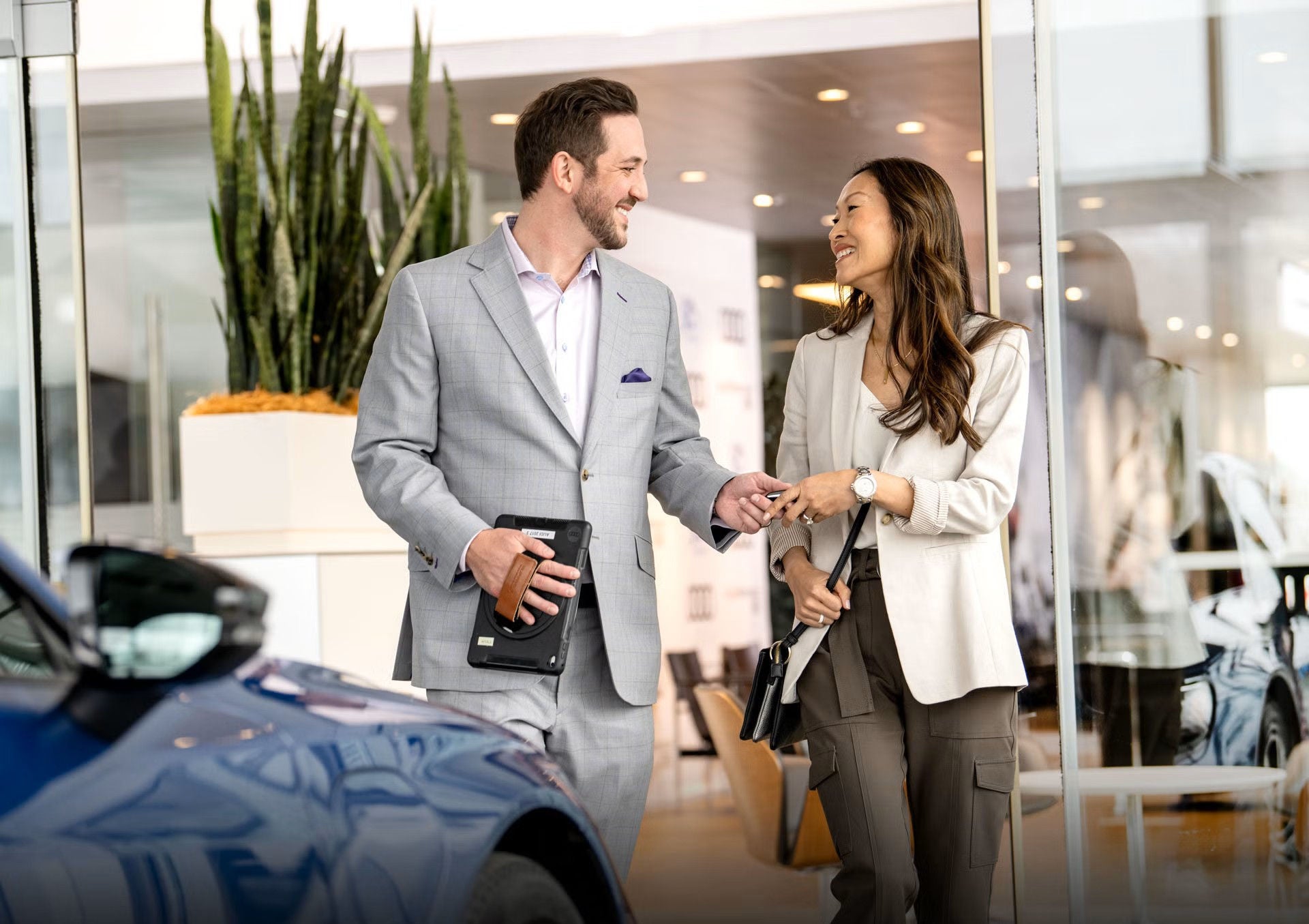 Audi Salesperson talking to customer