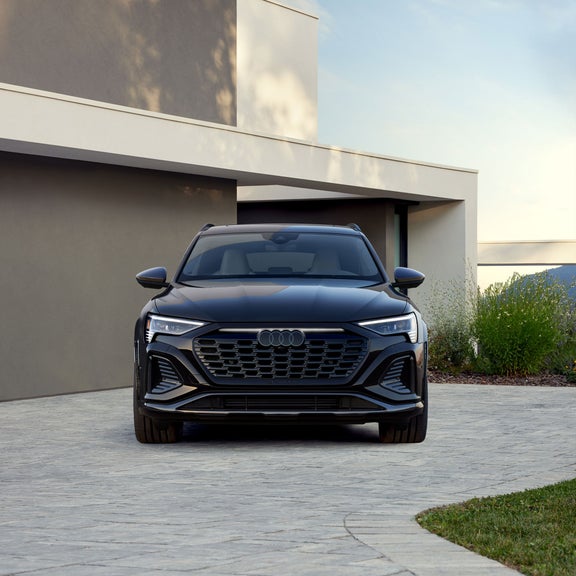 Front profile of the Audi SQ8 e-tron, showing the LED headlights.