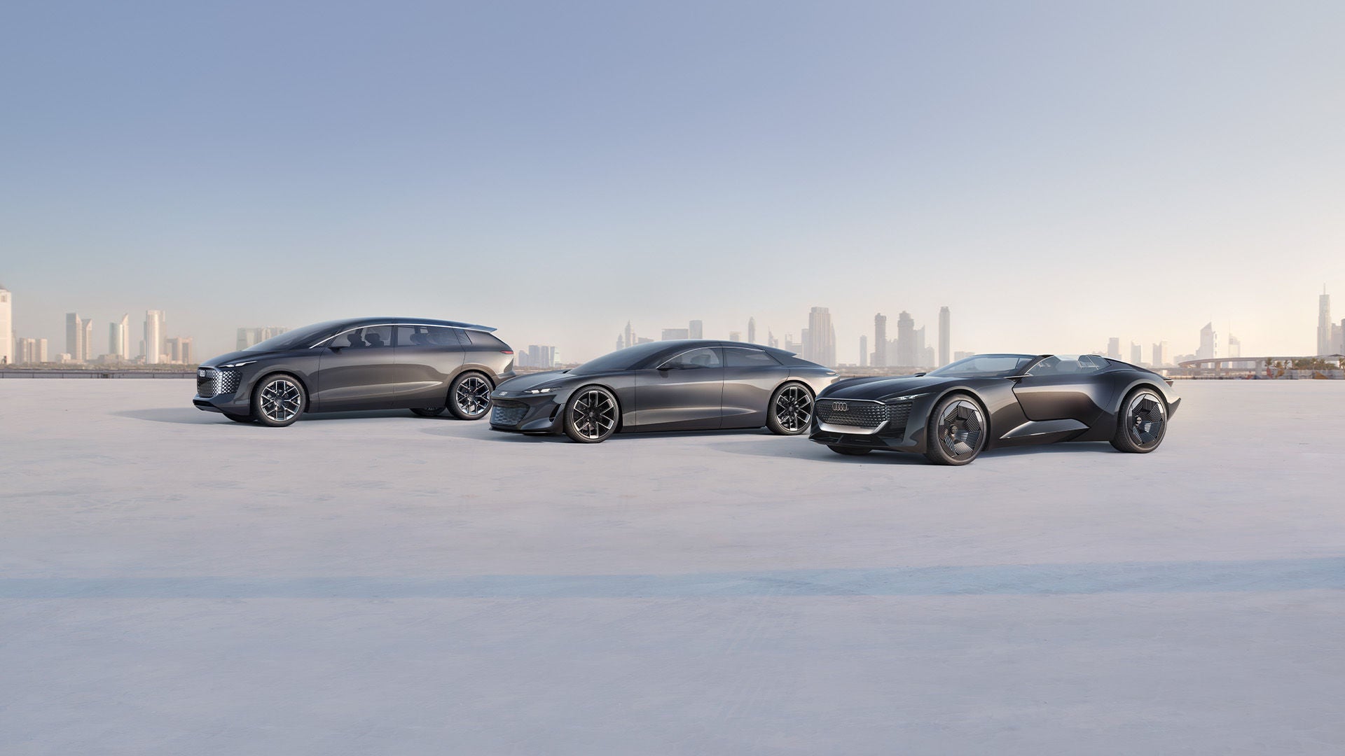 Side view of three Audi Sphere concept cars.