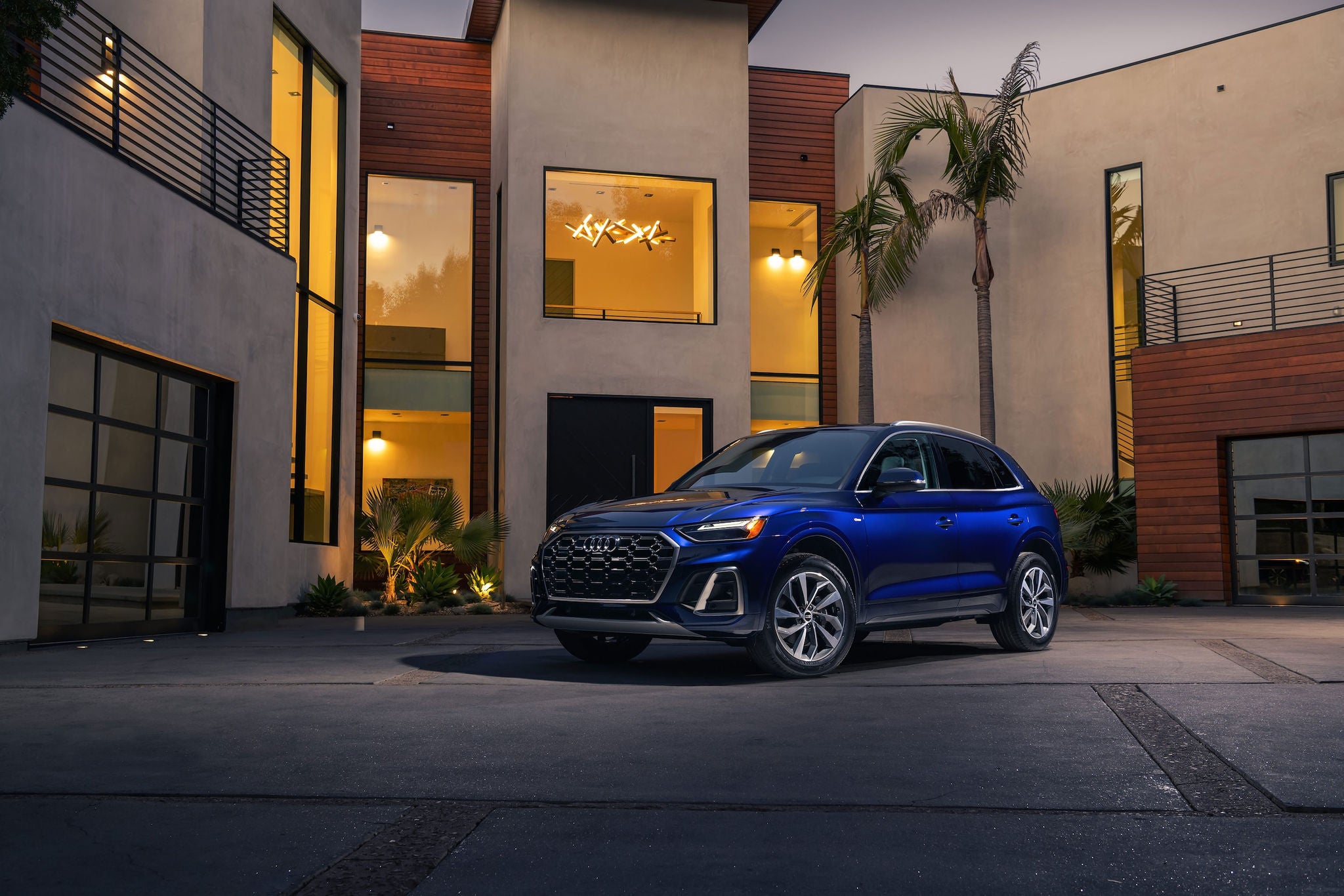 Audi Q5 parked in front of the house