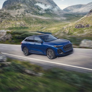 Aerial side view of the Audi SQ5 Sportback accelerating.