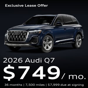 An Audi Q7 SUV parked.