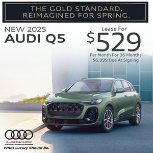 Side view of an Audi vehicle.